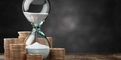 Golden coins and hourglass clock. Return on investment, deposit, growth of income and savings, time is money concept. 3d illustration