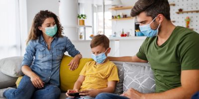 Beautiful Young Family Wearing Face Masks Against 38DLDNA