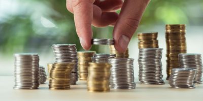 Cropped View Of Person Stacking Coins On Table Inv QHXPUQZ