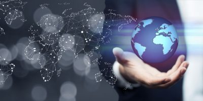 Businessman holding global network and data exchanges over the world