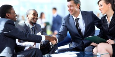 Business people shaking hands, finishing up a meeting