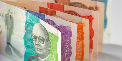 Colombia money, Colombian pesos, Stacked various banknotes, 10 thousand pesos banknote, Financial and business concept