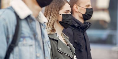 People In A Masks Stands On The Street CG9BYQF